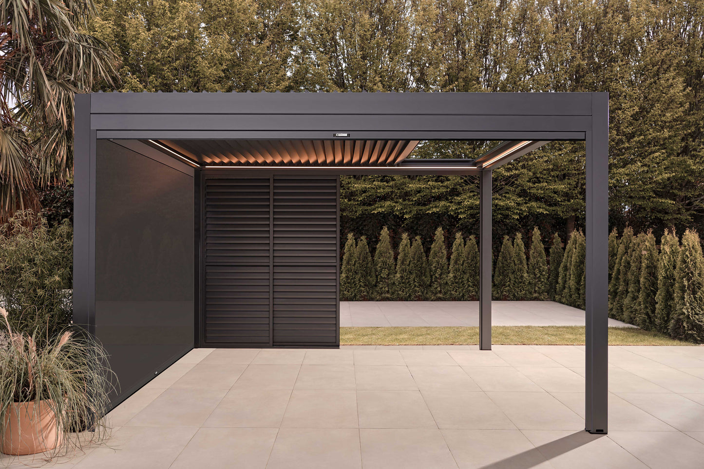 Luxe Electric Retractable Roof Pergola on patio with trees