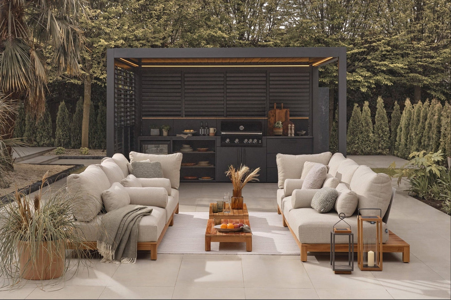 Luxe Electric Retractable Pergola with outdoor kitchen and sofa collection